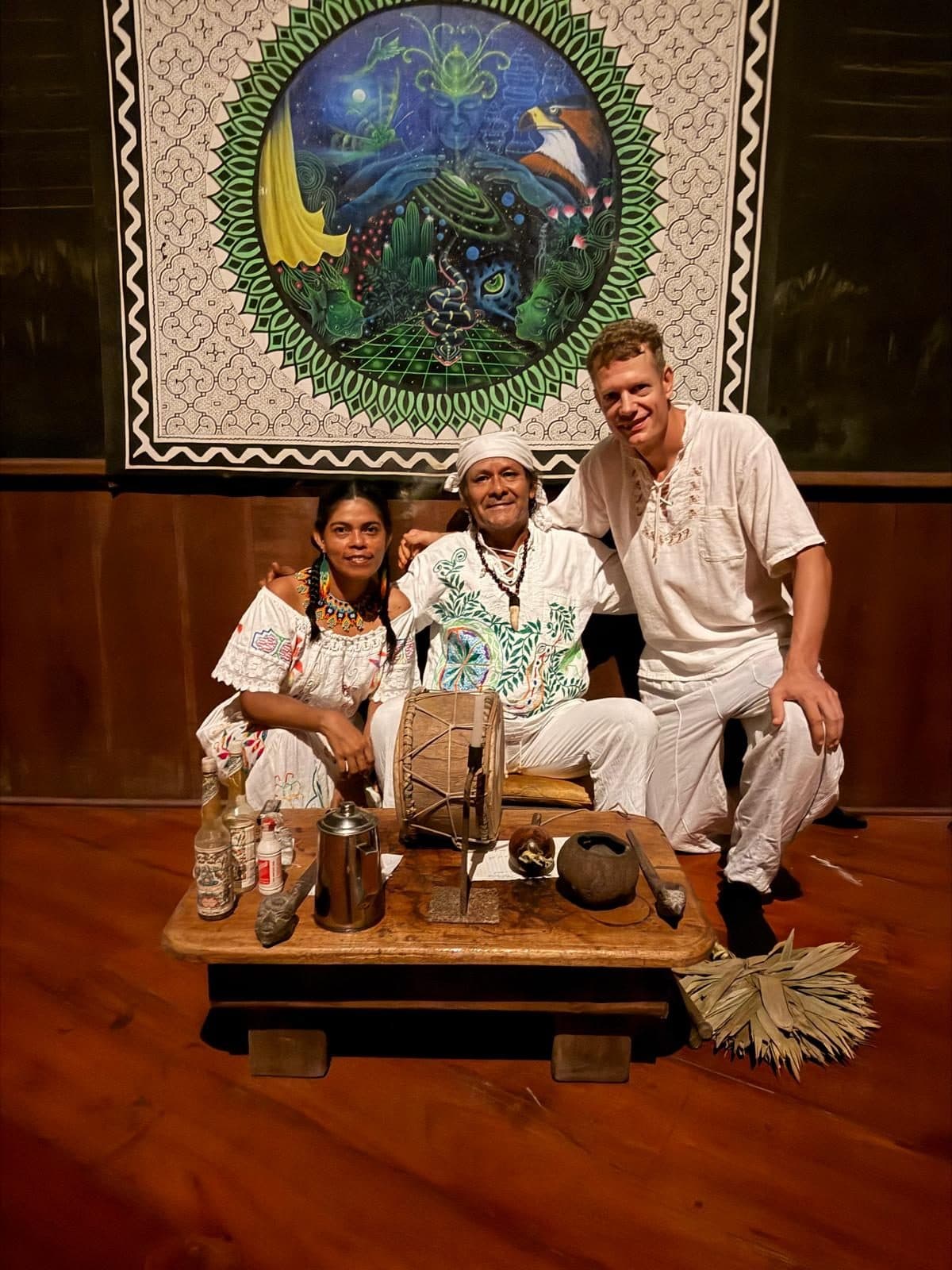 Vanesa, Arnaldo and Peter of Ayaselva beside a ceremony altar at their retreat centre in Peru.
